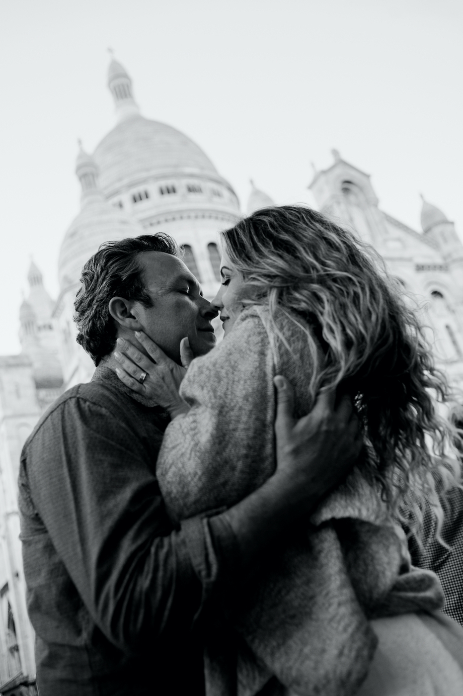 couple walking on paris streets